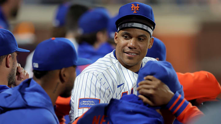 Apr 22, 2026; New York City, New York, USA; New York Mets designated hitter Juan Soto (22) talks to teammates in the dugout during the ninth inning against the Minnesota Twins at Citi Field. Mandatory Credit: Brad Penner-Imagn Images
