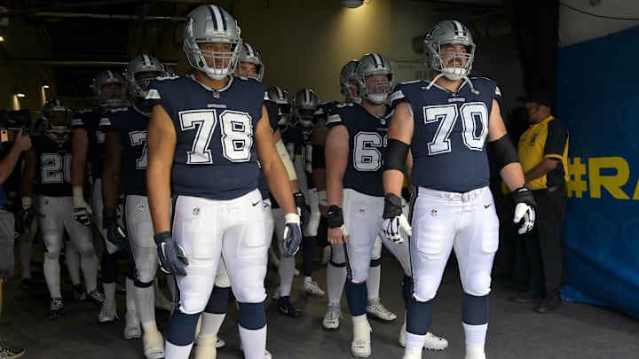 Oct 9, 2022; Inglewood, California, USA; Dallas Cowboys offensive tackle Terence Steele (78) and guard Zack Martin (70) enter the field for the game against the Los Angeles Rams at SoFi Stadium. Mandatory Credit: Jayne Kamin-Oncea-Imagn Images