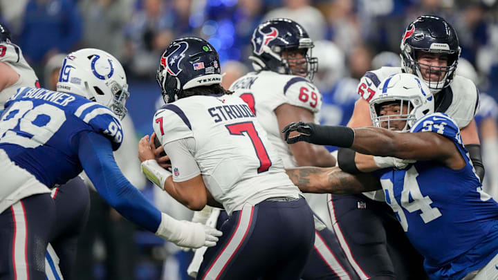 Indianapolis Colts defensive tackle DeForest Buckner (99) and Indianapolis Colts defensive end Tyquan Lewis (94) move in to sack Houston Texans quarterback C.J. Stroud (7) on Saturday, Jan. 6, 2024, during a game against the Houston Texans at Lucas Oil Stadium in Indianapolis. Indianapolis Colts defensive tackle DeForest Buckner (99) and Indianapolis Colts defensive end Tyquan Lewis (94) move in to sack Houston Texans quarterback C.J. Stroud (7) on Saturday, Jan. 6, 2024, during a game against the Houston Texans at Lucas Oil Stadium in Indianapolis.