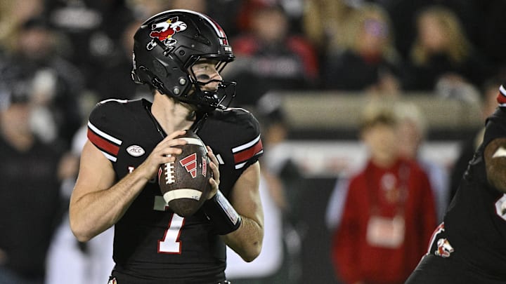 Nov 14, 2025; Louisville, Kentucky, USA;  Louisville Cardinals quarterback Miller Moss (7) looks to pass against the Clemson Tigers during the first half at L&N Federal Credit Union Stadium. Mandatory Credit: Jamie Rhodes-Imagn Images