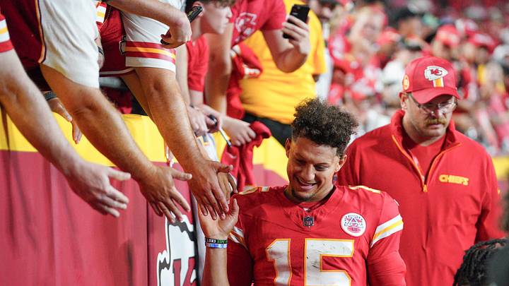 Sep 5, 2024; Kansas City, Missouri, USA; Kansas City Chiefs quarterback Patrick Mahomes (15) greets fans as he leaves the field after the win over the Baltimore Ravens at GEHA Field at Arrowhead Stadium. Mandatory Credit: Denny Medley-Imagn Images