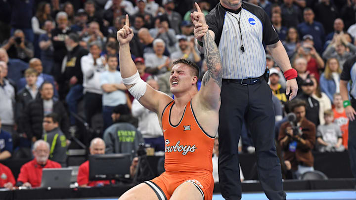 Mar 22, 2025; Philadelphia, PA, USA; Wyatt Hendrickson of the Oklahoma State Cowboys reacts after defeating Gable Steveson of the Minnesota Golden Gophers (not pictured) during the Division I Men's Wrestling Championship held at Wells Fargo Center. Mandatory Credit: Eric Hartline-Imagn Images