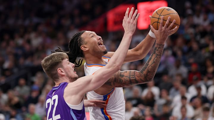 Apr 11, 2025; Salt Lake City, Utah, USA; Oklahoma City Thunder forward Jaylin Williams (right) is fouled by Utah Jazz forward Kyle Filipowski (left) while shooting the ball during the first quarter at Delta Center. Mandatory Credit: Chris Nicoll-Imagn Images Apr 11, 2025; Salt Lake City, Utah, USA; Oklahoma City Thunder forward Jaylin Williams (right) is fouled by Utah Jazz forward Kyle Filipowski (left) while shooting the ball during the first quarter at Delta Center. Mandatory Credit: Chris Nicoll-Imagn Images