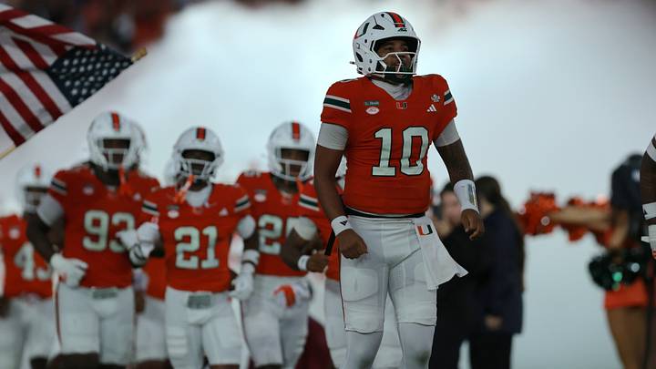 Miami Hurricanes quarterback Darian Mensah (10) takes the field before a game against the Florida State Seminoles Miami Hurricanes quarterback Darian Mensah (10) takes the field before a game against the Florida State Seminoles