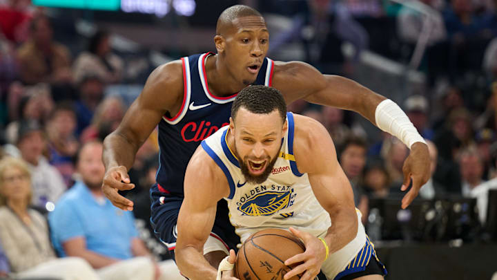 Kris Dunn and Stephen Curry