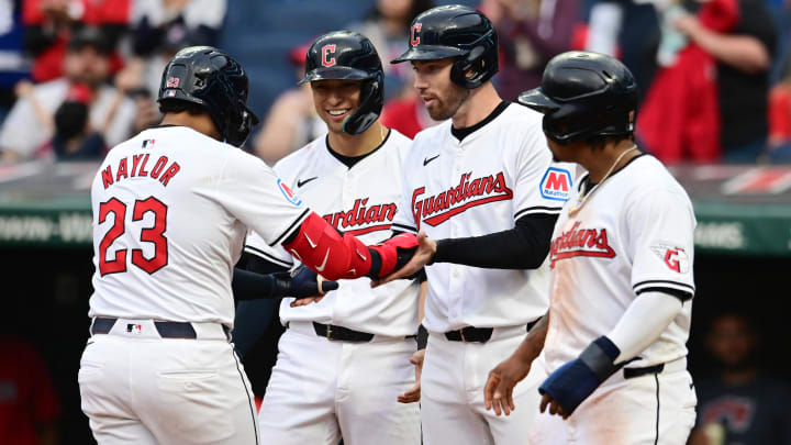 May 4, 2024; Cleveland, Ohio, USA; Cleveland Guardians designated hitter Bo Naylor (23) celebrates with center fielder Tyler Freeman, middle left, and first baseman David Fry, middle right, and third baseman Jose Ramirez (11) after hitting a grand slam home run during the sixth inning against the Los Angeles Angels at Progressive Field. Mandatory Credit: Ken Blaze-USA TODAY Sports May 4, 2024; Cleveland, Ohio, USA; Cleveland Guardians designated hitter Bo Naylor (23) celebrates with center fielder Tyler Freeman, middle left, and first baseman David Fry, middle right, and third baseman Jose Ramirez (11) after hitting a grand slam home run during the sixth inning against the Los Angeles Angels at Progressive Field. Mandatory Credit: Ken Blaze-USA TODAY Sports