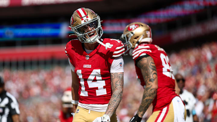 Nov 10, 2024; Tampa, Florida, USA; San Francisco 49ers wide receiver Ricky Pearsall (14) celebrates after scoring a touchdown against the Tampa Bay Buccaneers in the first quarter at Raymond James Stadium. Mandatory Credit: Nathan Ray Seebeck-Imagn Images