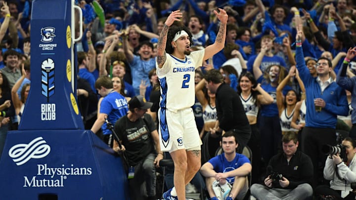 Dec 4, 2024; Omaha, Nebraska, USA; Creighton Bluejays guard Pop Isaacs (2) reacts to the crowd after making a three point basket against the Kansas Jayhawks during the second half at CHI Health Center Omaha. Mandatory Credit: Steven Branscombe-Imagn Images