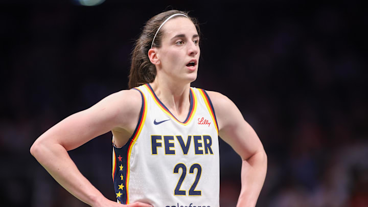 Indiana Fever guard Caitlin Clark (22) in action against the Atlanta Dream in the first half at State Farm Arena.