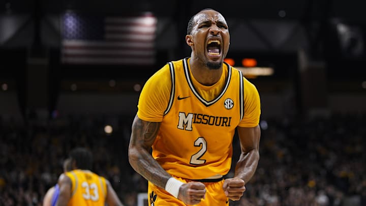 Dec 8, 2024; Columbia, Missouri, USA; Missouri Tigers guard Tamar Bates (2) celebrates after a play against the Kansas Jayhawks during the first half at Mizzou Arena. Mandatory Credit: Jay Biggerstaff-Imagn Images