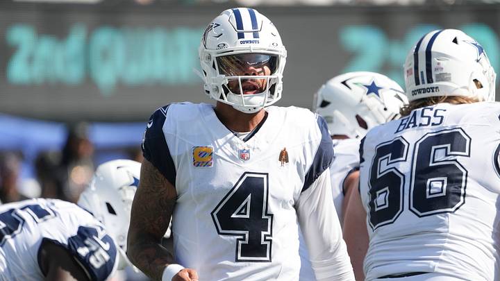 Dallas Cowboys quarterback Dak Prescott looks towards the sidelines against the New York Jets at MetLife Stadium. Dallas Cowboys quarterback Dak Prescott looks towards the sidelines against the New York Jets at MetLife Stadium.