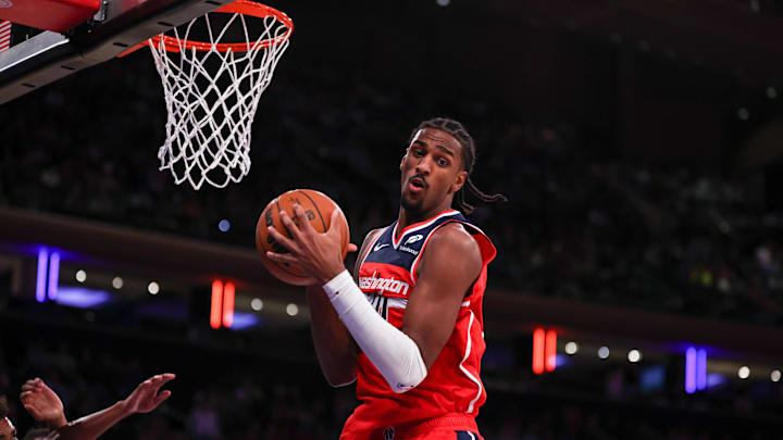Oct 9, 2024; New York, New York, USA; Washington Wizards forward Alex Sarr (20) rebounds during the second half against the New York Knicks at Madison Square Garden. Mandatory Credit: Vincent Carchietta-Imagn Images