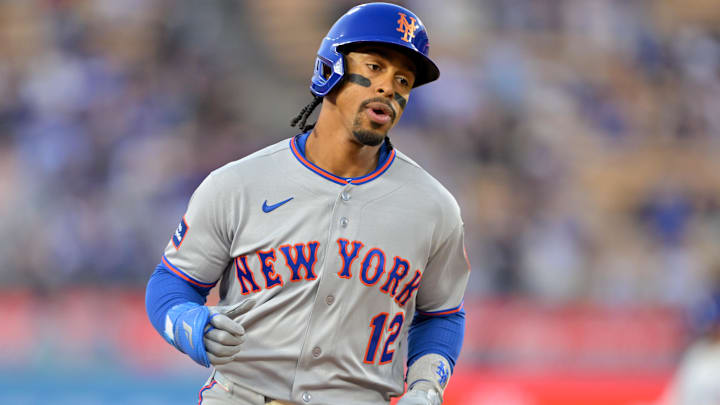 Apr 14, 2026; Los Angeles, California, USA; New York Mets shortstop Francisco Lindor (12) rounds the bases after hitting a solo home run against the Los Angeles Dodgers during the first inning at Dodger Stadium. Mandatory Credit: Jayne Kamin-Oncea-Imagn Images
