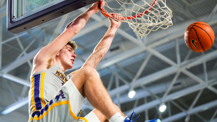 Montverde Academy's Trent Sisley dunks at Suncoast Credit Union Arena in Fort Myers, Fla.