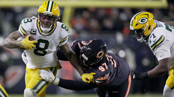 Green Bay Packers running back Josh Jacobs (8) is tackled by Chicago Bears defensive tackle Andrew Billings (97) during the second quarter of their wild card playoff game Saturday, January 10, 2026 at Soldier Field in Chicago, Illinois. Green Bay Packers running back Josh Jacobs (8) is tackled by Chicago Bears defensive tackle Andrew Billings (97) during the second quarter of their wild card playoff game Saturday, January 10, 2026 at Soldier Field in Chicago, Illinois.