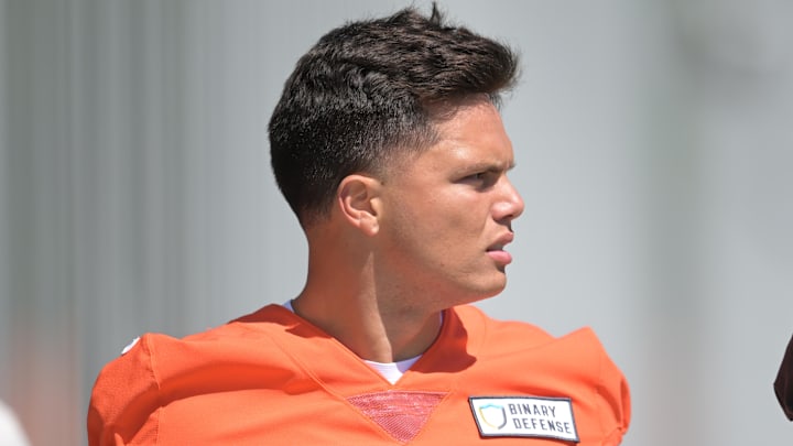 May 9, 2025; Berea, OH, USA; Cleveland Browns quarterback Dillon Gabriel (5) walks off the field after rookie minicamp at CrossCountry Mortgage Campus. Mandatory Credit: Ken Blaze-Imagn Images