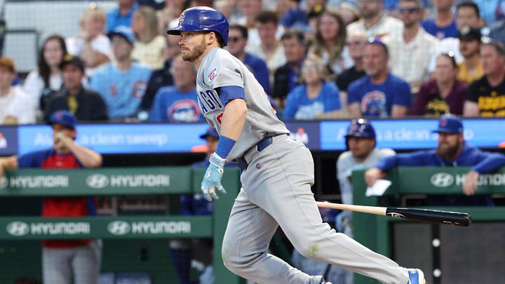 May 28, 2026; Pittsburgh, Pennsylvania, USA;  Chicago Cubs left fielder Ian Happ (8) hits an infield single against the Pittsburgh Pirates during the sixth inning at PNC Park. Mandatory Credit: Charles LeClaire-Imagn Images