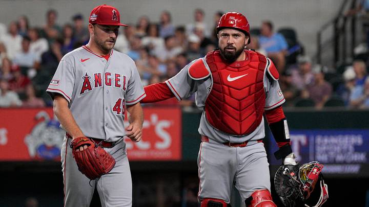 Los Angeles Angels catcher Travis d’Arnaud pats pitcher Reid Detmers. Los Angeles Angels catcher Travis d’Arnaud pats pitcher Reid Detmers.