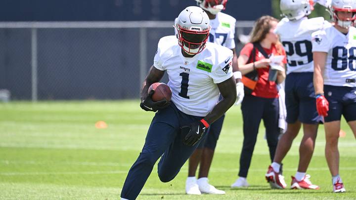 New England Patriots wide receiver A.J. Brown (1) runs after making a catch during the team's OTA at Gillette Stadium. New England Patriots wide receiver A.J. Brown (1) runs after making a catch during the team's OTA at Gillette Stadium.