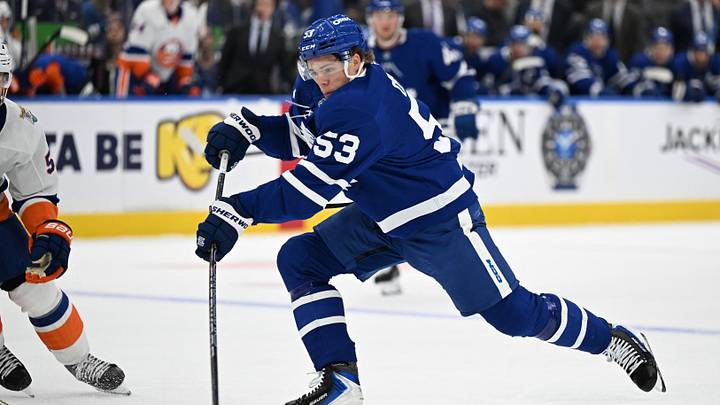 Sep 30, 2026; Toronto, Ontario, CAN;  Toronto Maple Leafs forward Easton Cowan (53) steps into a shot against the New York Islanders in the first period at Scotiabank Arena.  Mandatory Credit: Dan Hamilton-Imagn Images