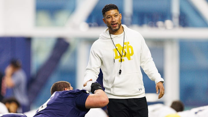 Head coach Marcus Freeman greets his players during a Notre Dame football practice at Irish Athletic Center on Friday, March 20, 2026, in South Bend.