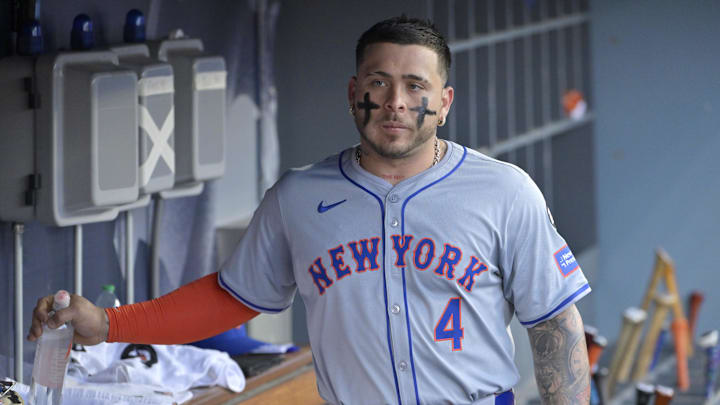 Oct 20, 2024; Los Angeles, California, USA; New York Mets catcher Francisco Alvarez (4) looks on in the dugout before game six against the Los Angeles Dodgers in the NLCS for the 2024 MLB playoffs at Dodger Stadium. Mandatory Credit: Jayne Kamin-Oncea-Imagn Images Oct 20, 2024; Los Angeles, California, USA; New York Mets catcher Francisco Alvarez (4) looks on in the dugout before game six against the Los Angeles Dodgers in the NLCS for the 2024 MLB playoffs at Dodger Stadium. Mandatory Credit: Jayne Kamin-Oncea-Imagn Images