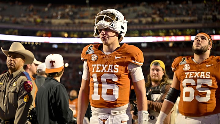 Dec 21, 2024; Austin, Texas, USA; Texas Longhorns quarterback Arch Manning (16) walks off the field after UT defeats the Clemson Tigers in the CFP National Playoff first round game at Darrell K Royal-Texas Memorial Stadium. Mandatory Credit: Jerome Miron-Imagn Images