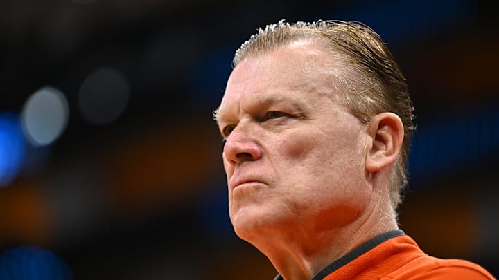 Mar 28, 2026; Houston, TX, USA; Illinois Fighting Illini head coach Brad Underwood looks on before an Elite Eight game of the South Regional of the men's 2026 NCAA Tournament against the Iowa Hawkeyes at Toyota Center. Mandatory Credit: Maria Lysaker-Imagn Images Mar 28, 2026; Houston, TX, USA; Illinois Fighting Illini head coach Brad Underwood looks on before an Elite Eight game of the South Regional of the men's 2026 NCAA Tournament against the Iowa Hawkeyes at Toyota Center. Mandatory Credit: Maria Lysaker-Imagn Images