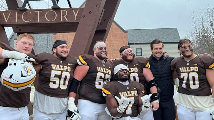 Michael Brewster, second from right, with his Valparaiso linemen.
