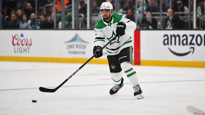 Mar 31, 2025; Seattle, Washington, USA; Dallas Stars defenseman Mathew Dumba (3) passes the puck against the Seattle Kraken during the third period at Climate Pledge Arena. Mandatory Credit: Steven Bisig-Imagn Images
