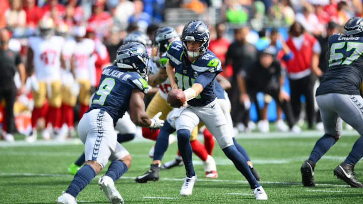 Sep 7, 2025; Seattle, Washington, USA; Seattle Seahawks quarterback Sam Darnold (14) hands the ball off to Seattle Seahawks running back Kenneth Walker III (9) during the second half at Lumen Field. Mandatory Credit: Steven Bisig-Imagn Images Sep 7, 2025; Seattle, Washington, USA; Seattle Seahawks quarterback Sam Darnold (14) hands the ball off to Seattle Seahawks running back Kenneth Walker III (9) during the second half at Lumen Field. Mandatory Credit: Steven Bisig-Imagn Images