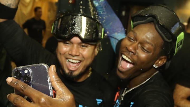 Sep 30, 2023; Pittsburgh, Pennsylvania, USA; Miami Marlins Luis Arraez (left) and Jazz Chisholm