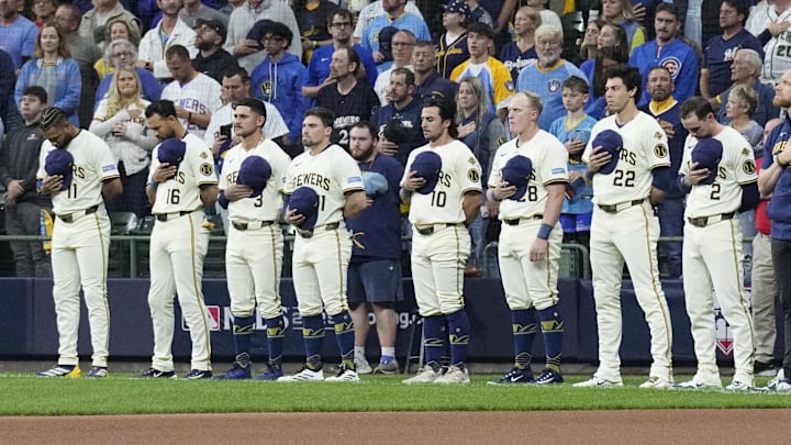 Oct 11, 2025; Milwaukee, Wisconsin, USA; Milwaukee Brewers players line up for the national anthem before game five against the Chicago Cubs in the NLDS round for the 2025 MLB playoffs at American Family Field. Mandatory Credit: Michael McLoone-Imagn Images Oct 11, 2025; Milwaukee, Wisconsin, USA; Milwaukee Brewers players line up for the national anthem before game five against the Chicago Cubs in the NLDS round for the 2025 MLB playoffs at American Family Field. Mandatory Credit: Michael McLoone-Imagn Images