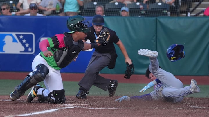 Daytona Tortugas catcher Alfredo Duno #16 makes the tag on sliding St. Lucie Mets runner Kevin Villavicenio #39, Friday June 13, 2025 at Jackie Robinson Ballpark.
