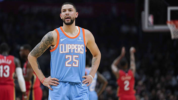 Mar 6, 2018; Los Angeles, CA, USA; Los Angeles Clippers guard Austin Rivers (25) reacts after a technical foul as New Orleans Pelicans guard Ian Clark (2) attempts a free throw during the second quarter at Staples Center. Mandatory Credit: Kelvin Kuo-Imagn Images