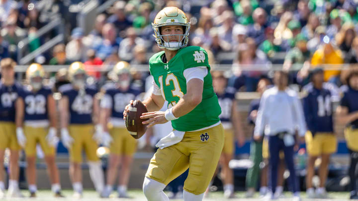 CJ Carr and the Notre Dame Fighting Irish are slight road favorites against the Miami Hurricanes in Week 1.