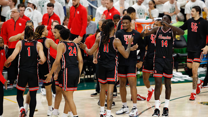 Jan 10, 2026; Waco, Texas, USA; The Houston Cougars bench reacts after a play against the Baylor Bears during the first half at Paul and Alejandra Foster Pavilion. Mandatory Credit: Chris Jones-Imagn Images Jan 10, 2026; Waco, Texas, USA; The Houston Cougars bench reacts after a play against the Baylor Bears during the first half at Paul and Alejandra Foster Pavilion. Mandatory Credit: Chris Jones-Imagn Images