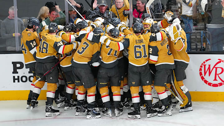 Apr 29, 2025; Las Vegas, Nevada, USA; Vegas Golden Knights players celebrate after the Golden Knights defeated the Minnesota Wild 3-2 in overtime in game five of the first round of the 2025 Stanley Cup Playoffs at T-Mobile Arena. Mandatory Credit: Stephen R. Sylvanie-Imagn Images
