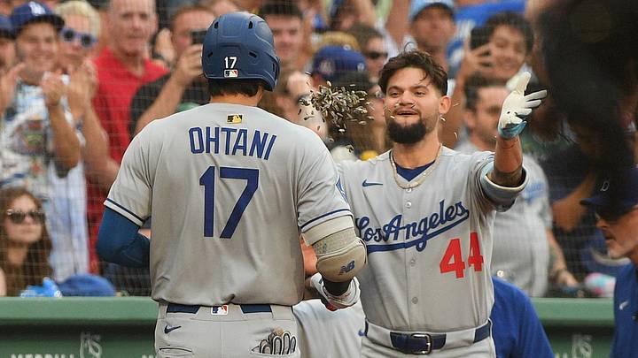 Jul 26, 2025; Boston, Massachusetts, USA; Los Angeles Dodgers center fielder Andy Pages (44) throws sunflower seeds at designated hitter Shohei Ohtani (17) after hitting a home run during the first inning against the Boston Red Sox at Fenway Park. Mandatory Credit: Bob DeChiara-Imagn Images Jul 26, 2025; Boston, Massachusetts, USA; Los Angeles Dodgers center fielder Andy Pages (44) throws sunflower seeds at designated hitter Shohei Ohtani (17) after hitting a home run during the first inning against the Boston Red Sox at Fenway Park. Mandatory Credit: Bob DeChiara-Imagn Images