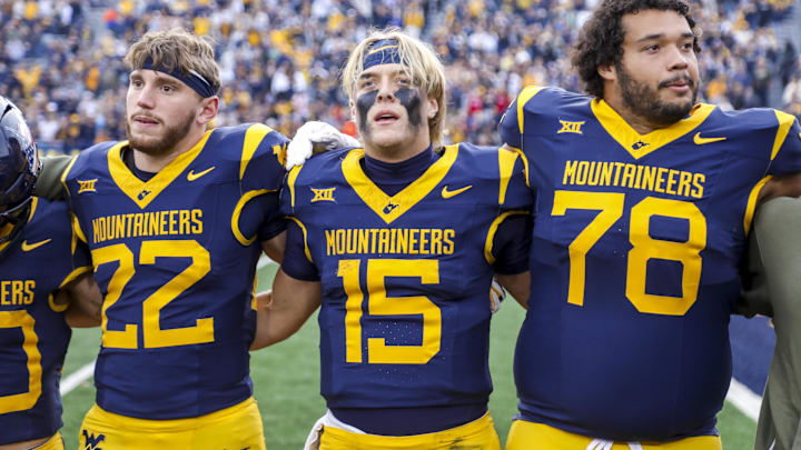 Nov 8, 2025; Morgantown, West Virginia, USA; West Virginia Mountaineers quarterback Scotty Fox Jr. (15) sings “Country Roads” after defeating the Colorado Buffaloes at Milan Puskar Stadium. Mandatory Credit: Ben Queen-Imagn Images Nov 8, 2025; Morgantown, West Virginia, USA; West Virginia Mountaineers quarterback Scotty Fox Jr. (15) sings “Country Roads” after defeating the Colorado Buffaloes at Milan Puskar Stadium. Mandatory Credit: Ben Queen-Imagn Images