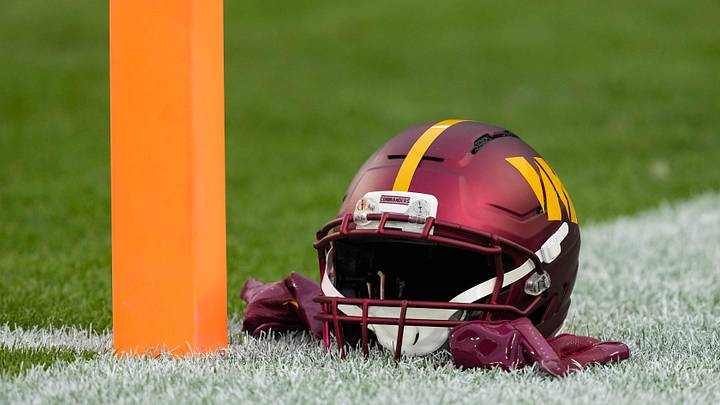 Sep 11, 2025; Green Bay, Wisconsin, USA;  General view of a Washington Commanders helmet during warmups prior to the game against the Green Bay Packers at Lambeau Field. Mandatory Credit: Jeff Hanisch-Imagn Images