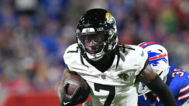 Sep 23, 2024; Orchard Park, New York, USA; Jacksonville Jaguars wide receiver Brian Thomas Jr. (7) turns up field after making a catch against the Buffalo Bills in the third quarter at Highmark Stadium. 