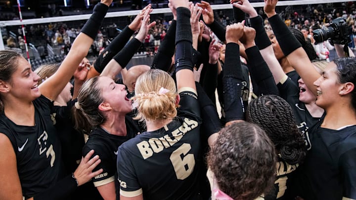 The Purdue Boilermakers celebrate after winning the Monon Spike Match 