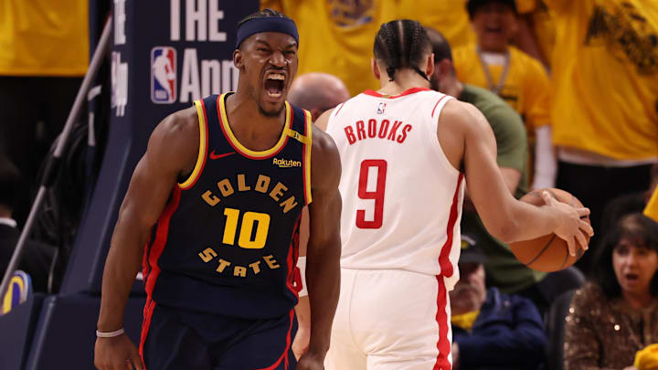 Apr 28, 2025; San Francisco, California, USA; Golden State Warriors forward Jimmy Butler III (10) reacts after scoring against Houston Rockets forward/guard Dillon Brooks (9) during the fourth quarter of game four of the 2025 NBA Playoffs first round at Chase Center. Mandatory Credit: Kelley L Cox-Imagn Images