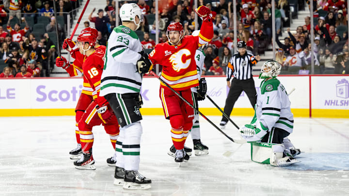 Nov 22, 2025; Calgary, Alberta, CAN; Calgary Flames left wing Joel Farabee (86) celebrates after scoring a goal on Dallas Stars goaltender Casey Desmith (1) during the third period at Scotiabank Saddledome. Mandatory Credit: Brett Holmes-Imagn Images Nov 22, 2025; Calgary, Alberta, CAN; Calgary Flames left wing Joel Farabee (86) celebrates after scoring a goal on Dallas Stars goaltender Casey Desmith (1) during the third period at Scotiabank Saddledome. Mandatory Credit: Brett Holmes-Imagn Images