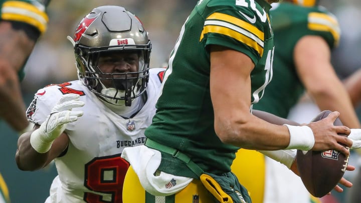 Tampa Bay Buccaneers defensive tackle Calijah Kancey (94) pressures Green Bay Packers quarterback Jordan Love (10) on Sunday, December 17, 2023, at Lambeau Field in Green Bay, Wis. Tampa Bay won the game, 34-20.