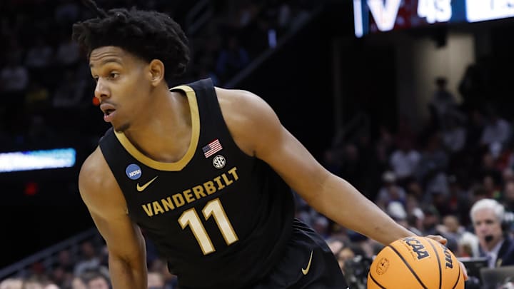 Mar 21, 2025; Cleveland, OH, USA; Vanderbilt Commodores guard AJ Hoggard (11) dribbles in the second half against the St. Mary's Gaels at Rocket Arena. Mandatory Credit: Rick Osentoski-Imagn Images