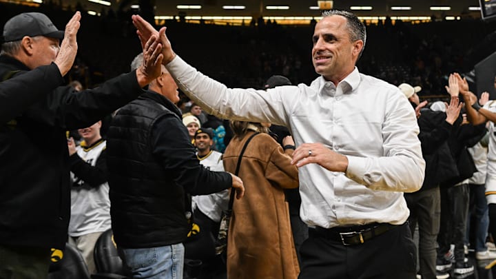 Jan 20, 2026; Iowa City, Iowa, USA; Iowa Hawkeyes head coach Ben McCollum reacts with fans after the game against the Rutgers Scarlet Knights at Carver-Hawkeye Arena. Mandatory Credit: Jeffrey Becker-Imagn Images
