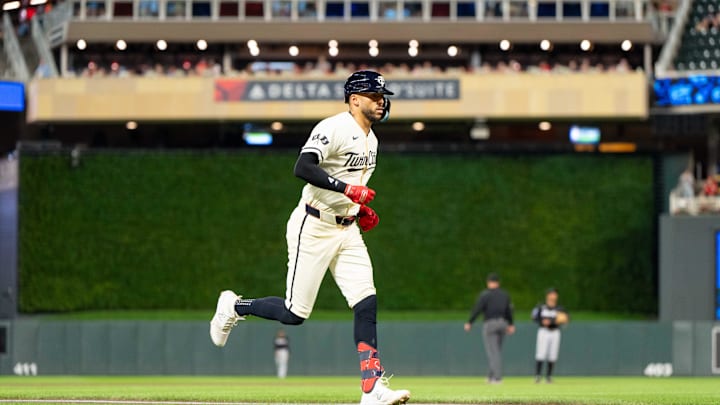 Minnesota Twins shortstop Carlos Correa (4) hits a home run against the Miami Marlins in the sixth inning at Target Field on Sept 26.