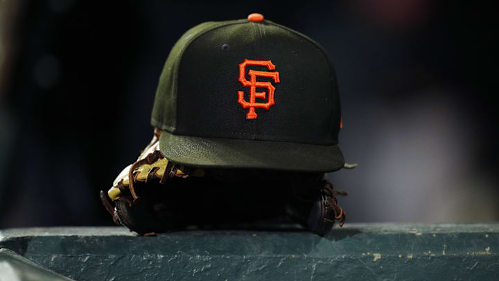 General view of a San Francisco Giants cap and glove.
